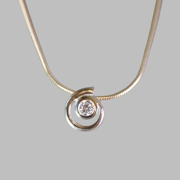 Sterling Silver and CZ Swirl Pendant by JB Designs.