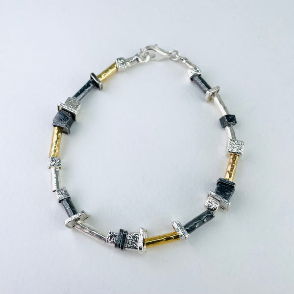 Silver and Rolled Gold Linked Bracelet by JB Designs.