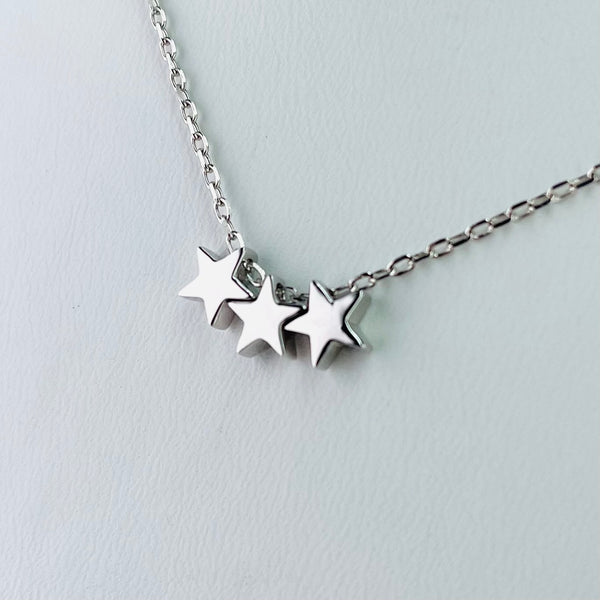 Silver Triple Silver Star Necklace.