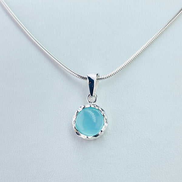 Small Textured Sterling Silver and Chalcedony Pendant.