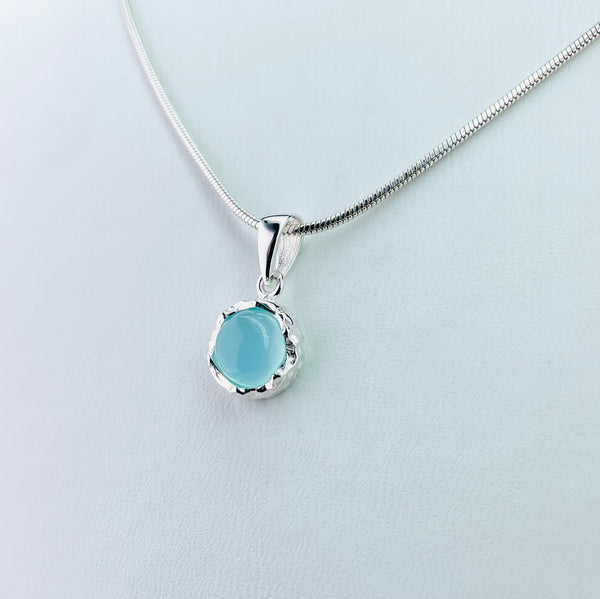 Small Textured Sterling Silver and Chalcedony Pendant.