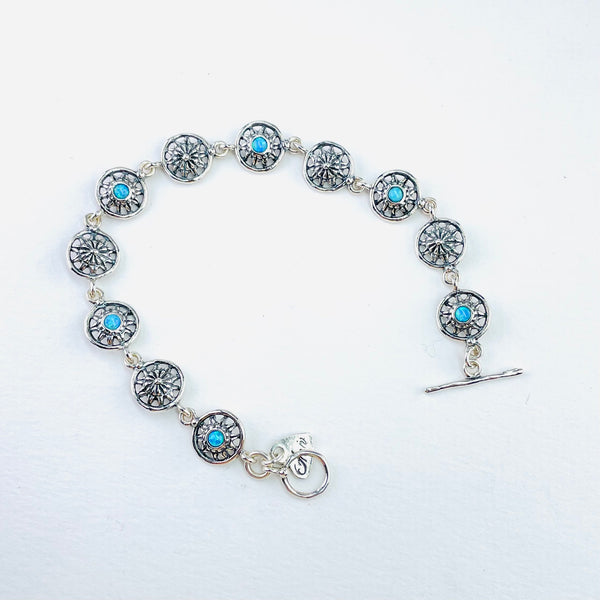 Opal and Patterned Silver Bracelet.