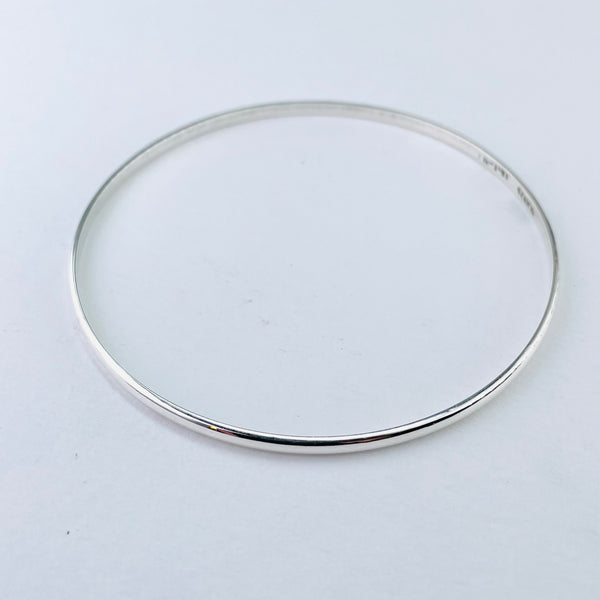 Lightweight, Delicate Polished Sterling Silver Bangle Bracelet.