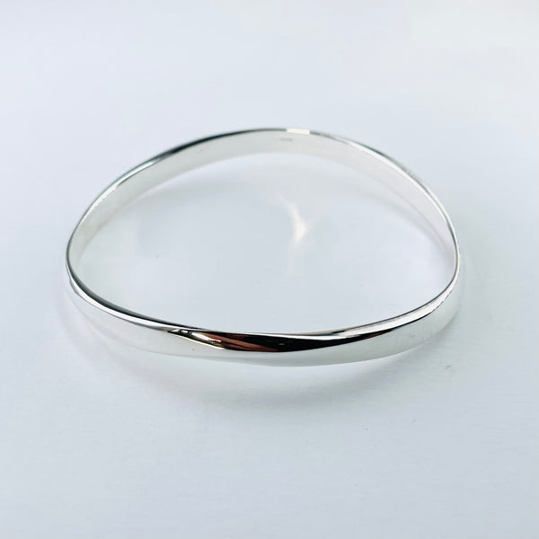 Gently Waved Sterling Silver Bangle.