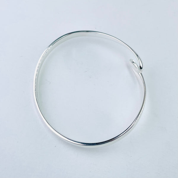 Twisted Top Sterling Silver Bangle.