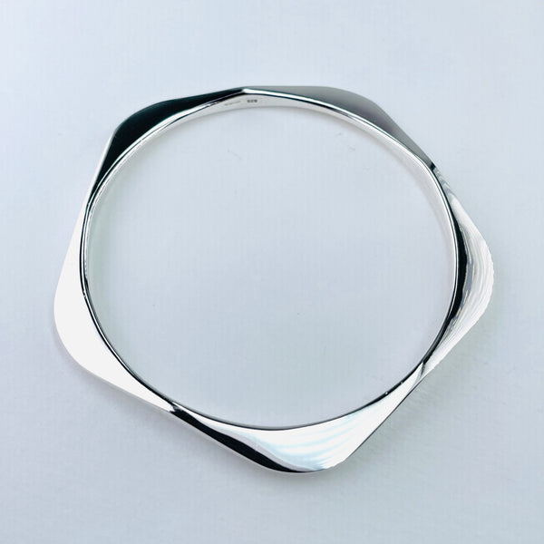 Five Curves Sterling Silver Bangle.