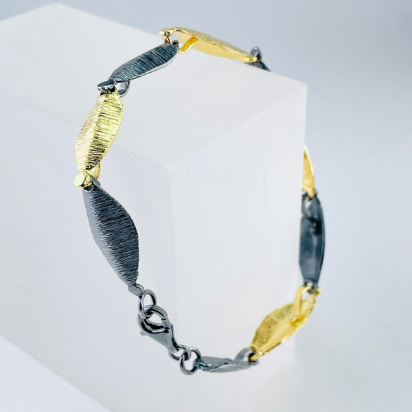 Silver and Gold Plated Leaf Linked Bracelet by JB Designs.
