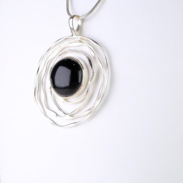 Silver Swirl and Black Onyx Pendant.