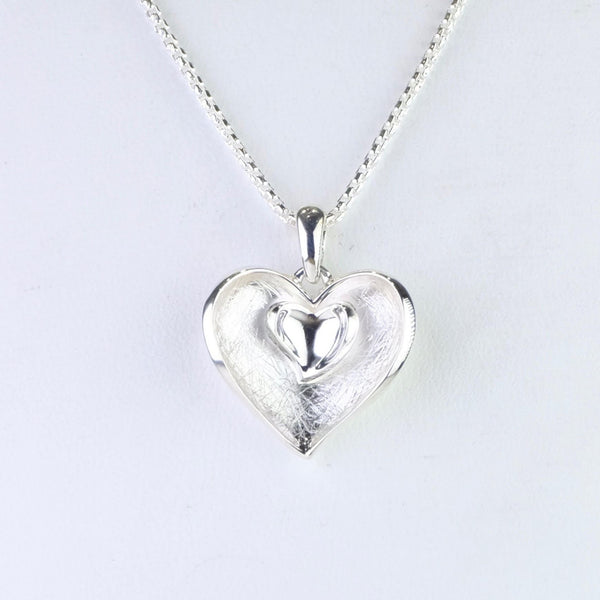 Textured Sterling Silver Double Layered Heart Pendant.