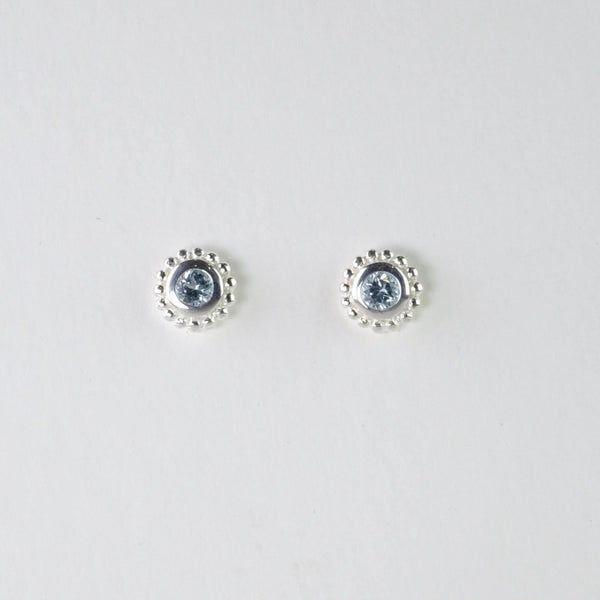 Small Silver and Blue Topaz Stud Earrings.