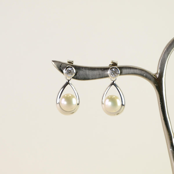 Silver, Cubic Zirconia and Pearl Drop Earrings.