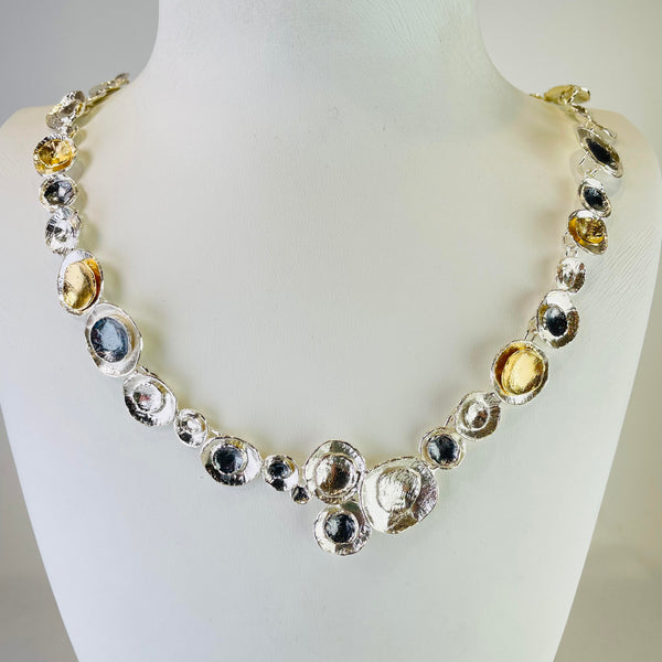 Satin Silver, Oxidized Silver and Gold Plated Linked Necklace by JB Designs.