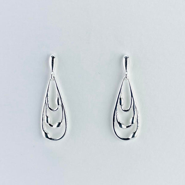 Tear drop shaped earrings. One larger tear drop, with a small smooth bean shape protusion attached towards the bottom.Within this are two smaller tear drop shapes with the same protusions. All attaced to a short stem on a post and butterfly fitting.