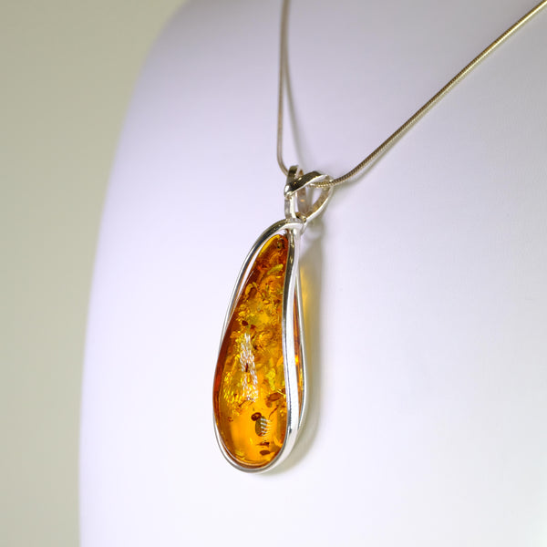 Long Tear Drop Amber and Silver Pendant.