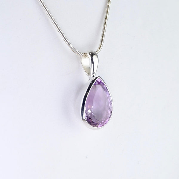 Sterling Silver and Faceted Amethyst Pendant.