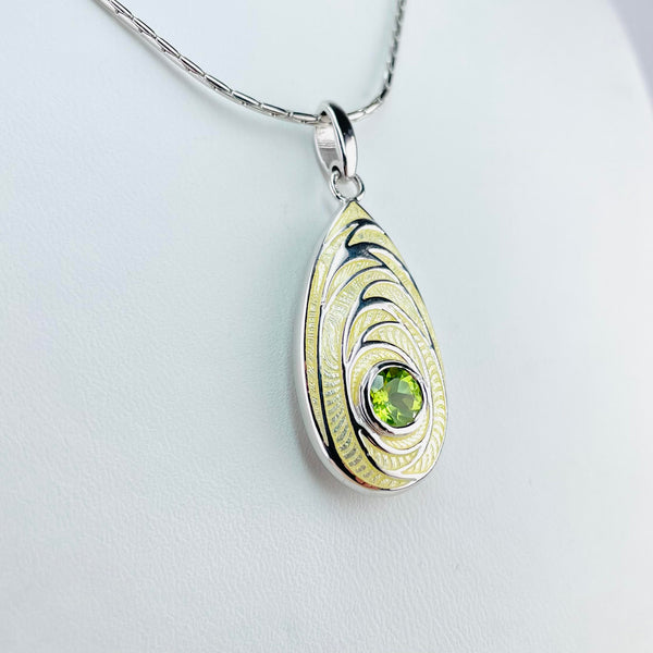 Silver, Yellow Enamel and Peridot Pendant by Nicole Barr.