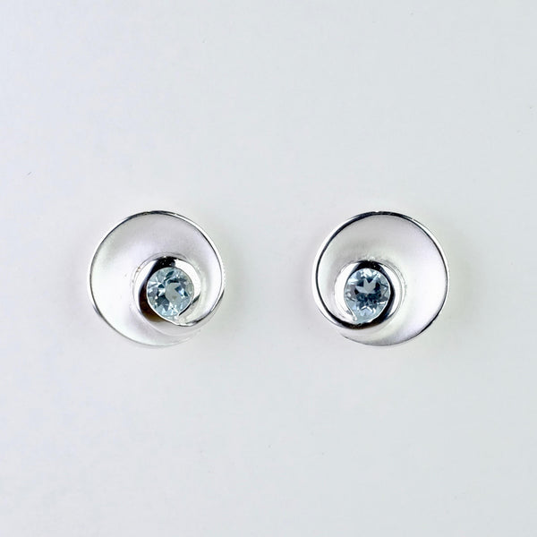 Silver and Blue Topaz Swirl Stud Earrings by JB Designs.