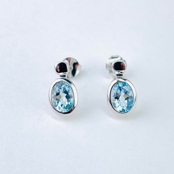 Oval Blue Topaz and Silver Stud Earrings by JB Designs.