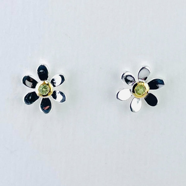 The earrings are formed of six evenly spaced high polished rounded petals. In the centre is a round lime green peridot stone surrounded by gold plated silver