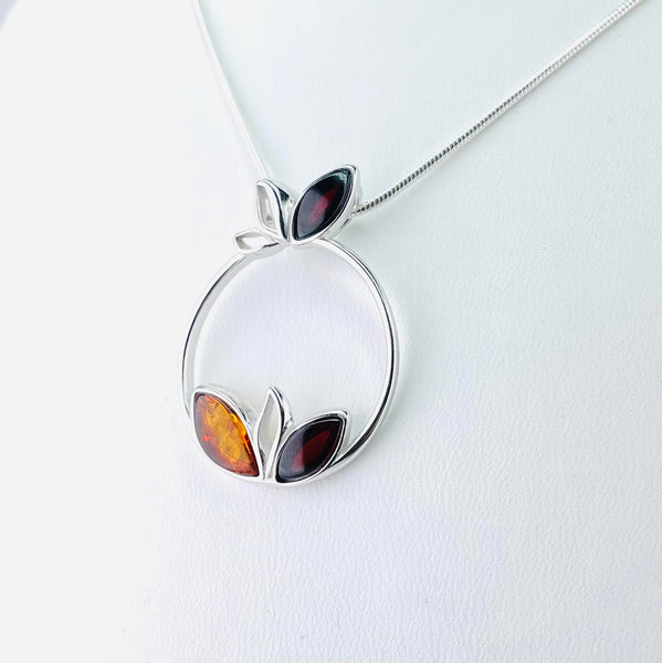 Two Shades of Amber with Sterling Silver Pendant.