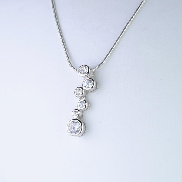 Sterling Silver and Multi CZ Pendant by JB Designs.