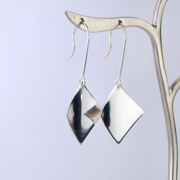 High Polished Silver Drop Earrings by JB Designs.