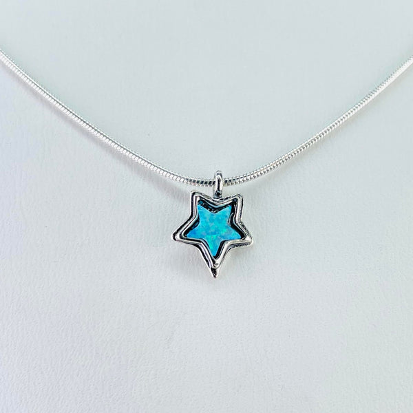 Small Silver and Opal Star Pendant.