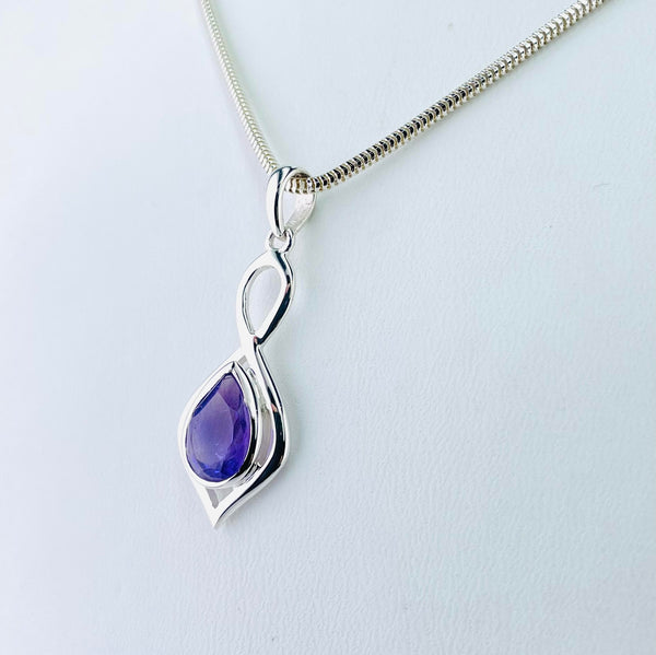 Decorative Sterling Silver and Tear Drop Amethyst Pendant.
