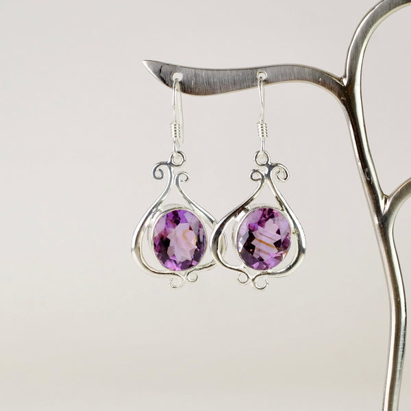 Decorative Sterling Silver and Faceted Amethyst Drop Earrings.