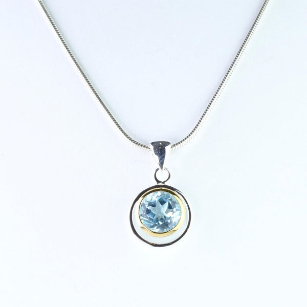 Blue Topaz and Silver and Gold Plated Pendant.