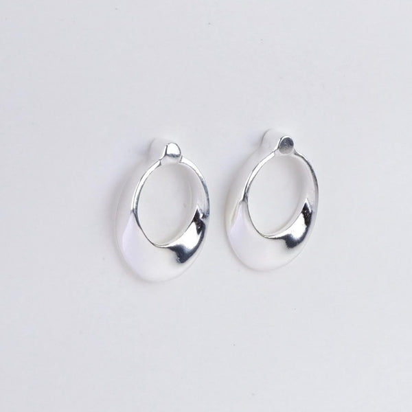 Oval Polished Silver Stud Earrings by JB Designs.