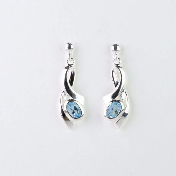 Oval Blue Topaz and Silver Earrings by JB Designs.