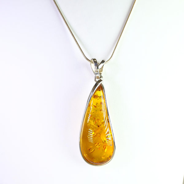 Long Tear Drop Amber and Silver Pendant.