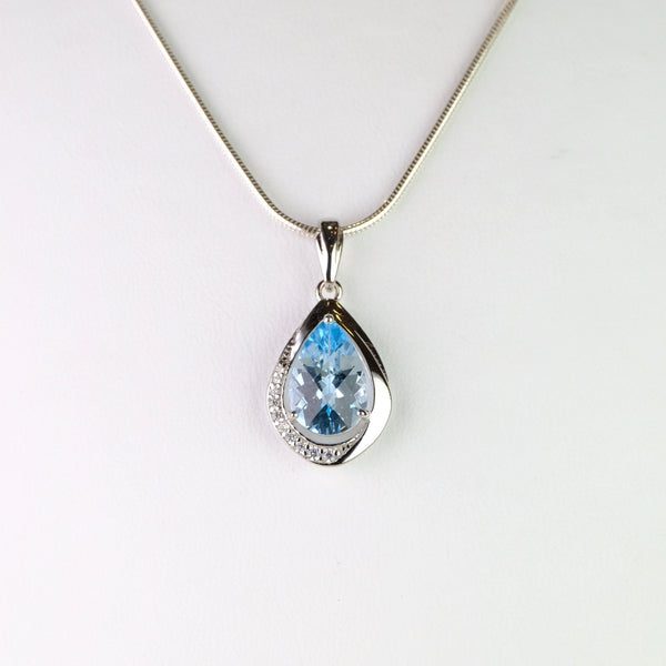 Blue Topaz, Cubic Zirconia and Silver Pendant.