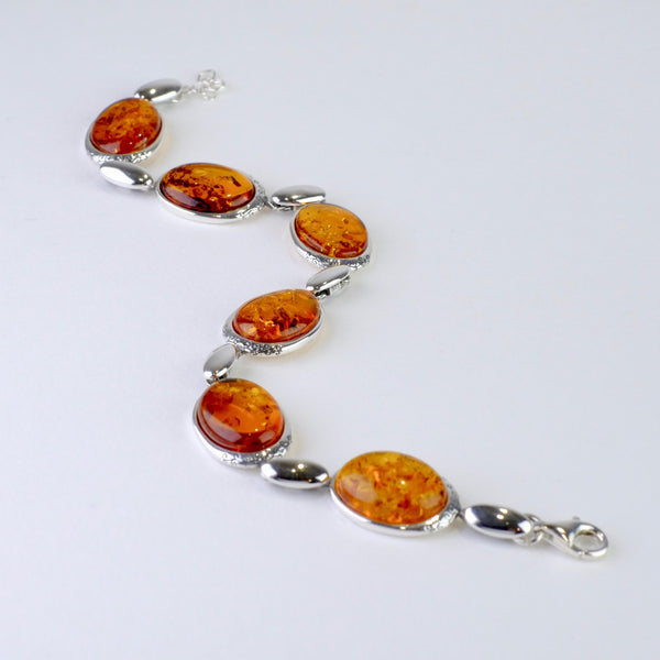 Silver and Oval Amber Bracelet.