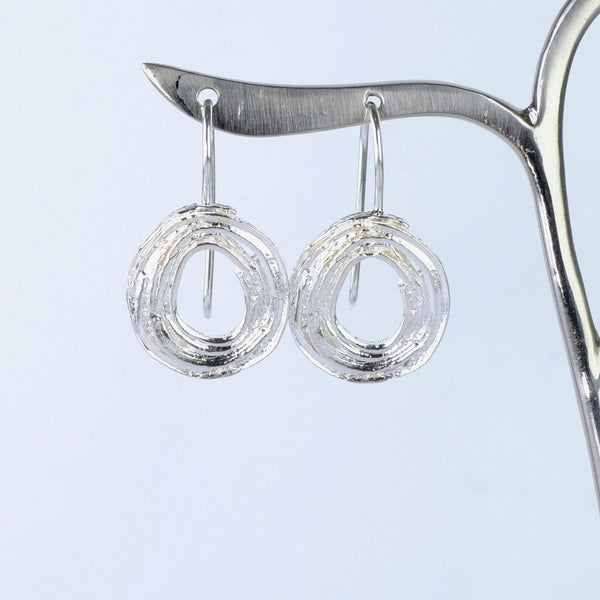 Textured Silver Round Drop Earrings by JB Designs.