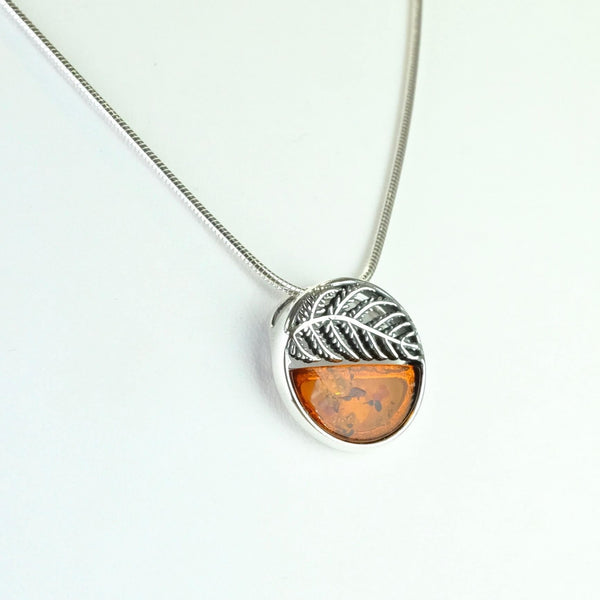 Round Fern Design Amber and Silver Pendant.