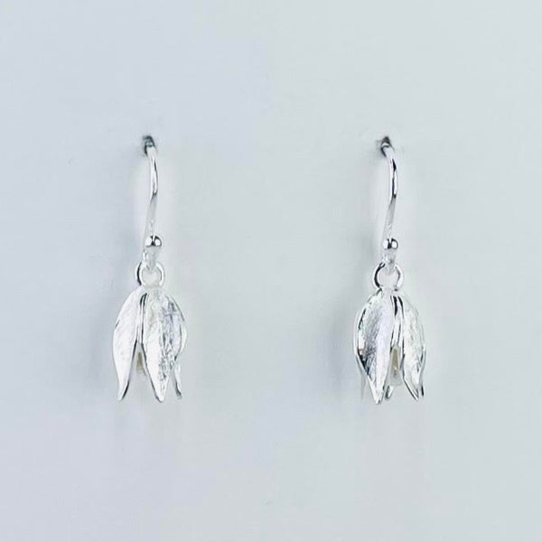 Matte finish silver earrings, each one looks like a single blubell flower falling straight from the silver hook.