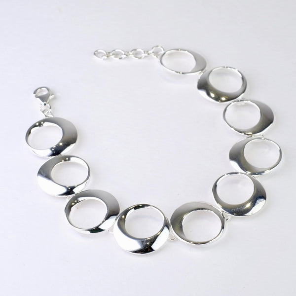 Polished Silver Linked Bracelet by JB Designs.