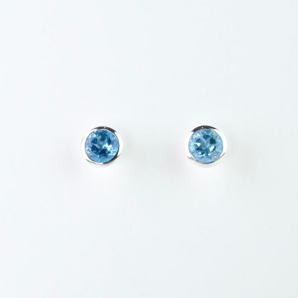 Conical Silver and Blue Topaz Stud Earrings.