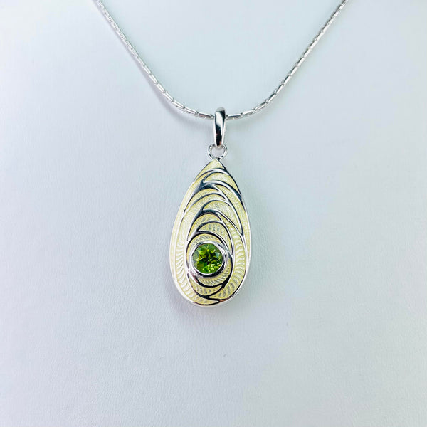 Silver, Yellow Enamel and Peridot Pendant by Nicole Barr.