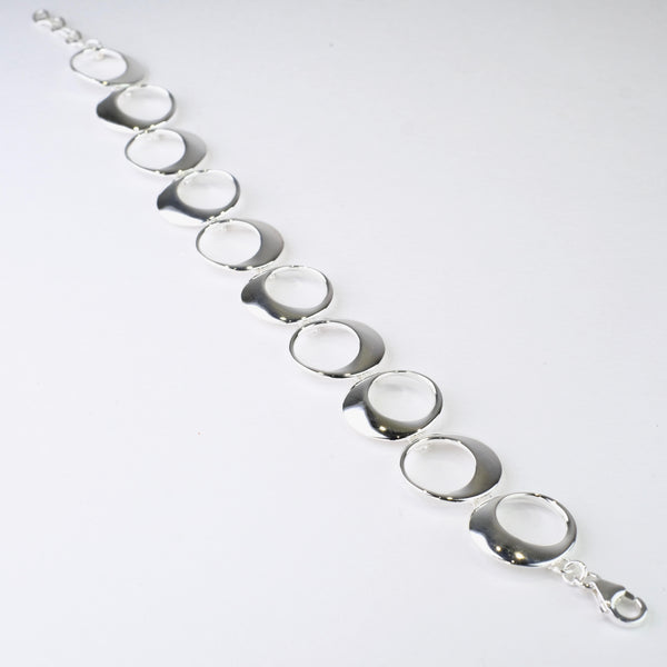 Polished Silver Linked Bracelet by JB Designs.