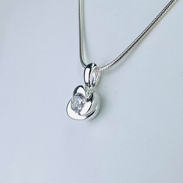 Delicate Cubic Zirconia and Silver Pendant.
