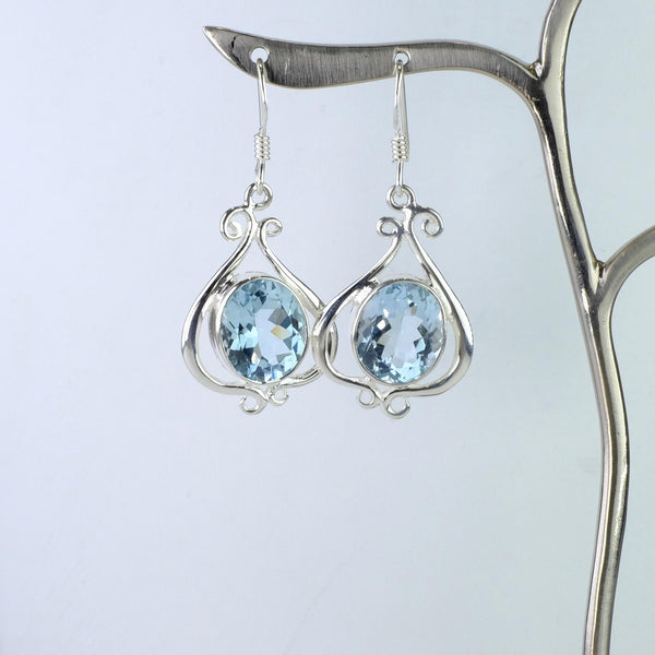 Ornate Silver and Blue Topaz Drop Earrings.