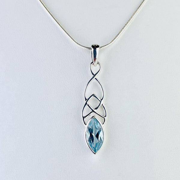 Decorative Celtic Design Blue Topaz and Silver Pendant.