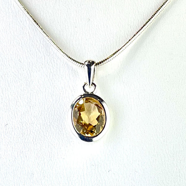 Small Oval Silver and Citrine Pendant.