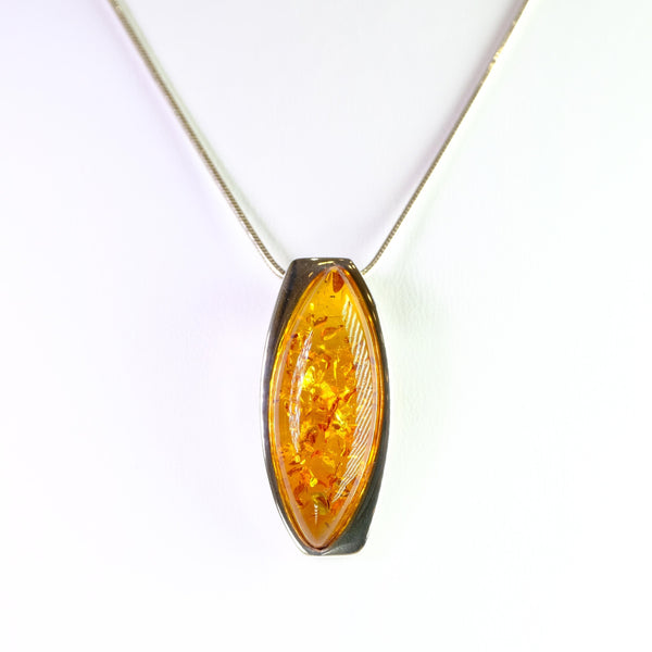 Simple Cognac Amber and Silver Pendant.