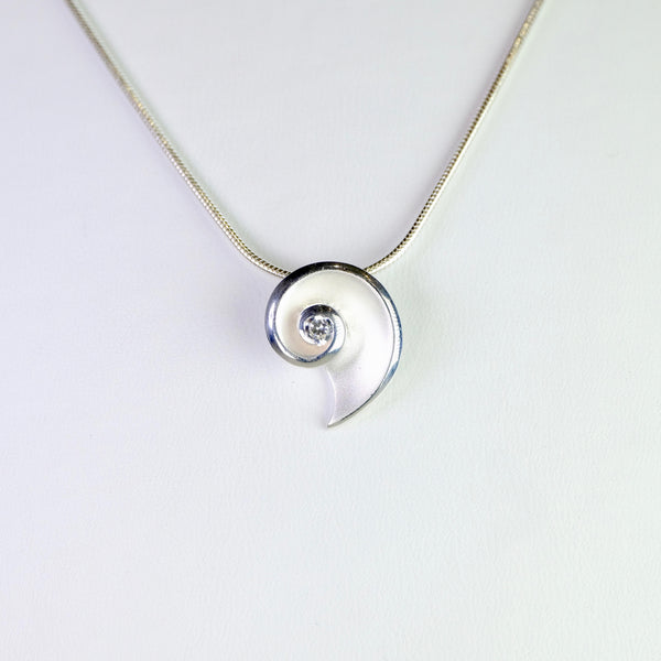 Sterling Silver and CZ  Swirl Pendant by JB Designs.