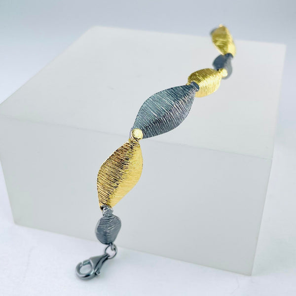 Silver and Gold Plated Leaf Linked Bracelet by JB Designs.