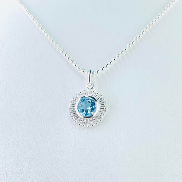 Round Sun Silver and Blue Topaz Pendant. Smithsonia